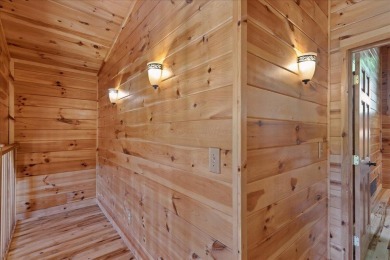 Discover this Custom Built Jubach Log Home perfectly placed on a on Hide-A-Way Hills Golf Club in Ohio - for sale on GolfHomes.com, golf home, golf lot
