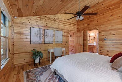 Discover this Custom Built Jubach Log Home perfectly placed on a on Hide-A-Way Hills Golf Club in Ohio - for sale on GolfHomes.com, golf home, golf lot