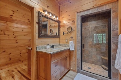 Discover this Custom Built Jubach Log Home perfectly placed on a on Hide-A-Way Hills Golf Club in Ohio - for sale on GolfHomes.com, golf home, golf lot