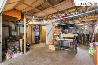 Ready to simplify your life? Check out this spacious mountain on Land Harbor Golf Course in North Carolina - for sale on GolfHomes.com, golf home, golf lot