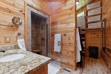 Discover this Custom Built Jubach Log Home perfectly placed on a on Hide-A-Way Hills Golf Club in Ohio - for sale on GolfHomes.com, golf home, golf lot
