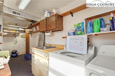 Ready to simplify your life? Check out this spacious mountain on Land Harbor Golf Course in North Carolina - for sale on GolfHomes.com, golf home, golf lot