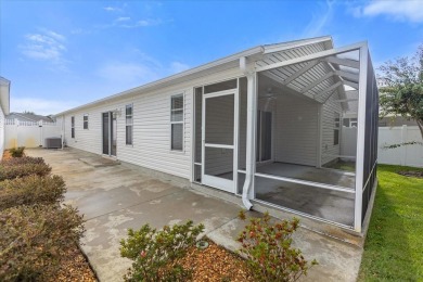 Welcome to this charming 3-bedroom, 2-bathroom bungalow villa on Egret Championship Golf Course in Florida - for sale on GolfHomes.com, golf home, golf lot