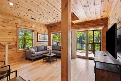 Discover this Custom Built Jubach Log Home perfectly placed on a on Hide-A-Way Hills Golf Club in Ohio - for sale on GolfHomes.com, golf home, golf lot