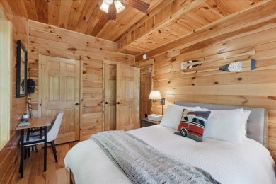 Discover this Custom Built Jubach Log Home perfectly placed on a on Hide-A-Way Hills Golf Club in Ohio - for sale on GolfHomes.com, golf home, golf lot
