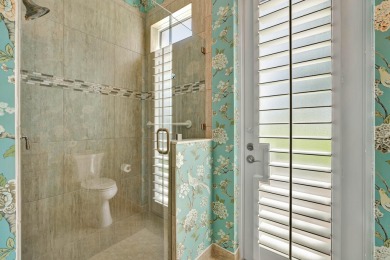 Welcome home to this immaculate 4-bedroom, 4 Bath, one-story on Jupiter Country Club in Florida - for sale on GolfHomes.com, golf home, golf lot