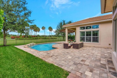 Welcome home to this immaculate 4-bedroom, 4 Bath, one-story on Jupiter Country Club in Florida - for sale on GolfHomes.com, golf home, golf lot