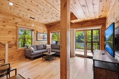 Discover this Custom Built Jubach Log Home perfectly placed on a on Hide-A-Way Hills Golf Club in Ohio - for sale on GolfHomes.com, golf home, golf lot