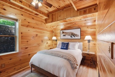 Discover this Custom Built Jubach Log Home perfectly placed on a on Hide-A-Way Hills Golf Club in Ohio - for sale on GolfHomes.com, golf home, golf lot