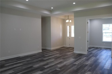 This stunning and luxurious new home by Spire Homes, a on Southern Hills Plantation Club in Florida - for sale on GolfHomes.com, golf home, golf lot