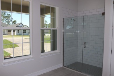 This stunning and luxurious new home by Spire Homes, a on Southern Hills Plantation Club in Florida - for sale on GolfHomes.com, golf home, golf lot