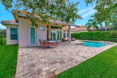 Welcome home to this immaculate 4-bedroom, 4 Bath, one-story on Jupiter Country Club in Florida - for sale on GolfHomes.com, golf home, golf lot