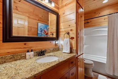 Discover this Custom Built Jubach Log Home perfectly placed on a on Hide-A-Way Hills Golf Club in Ohio - for sale on GolfHomes.com, golf home, golf lot