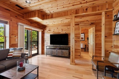 Discover this Custom Built Jubach Log Home perfectly placed on a on Hide-A-Way Hills Golf Club in Ohio - for sale on GolfHomes.com, golf home, golf lot