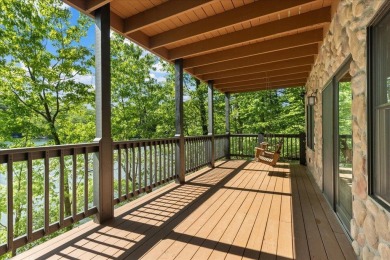 Discover this Custom Built Jubach Log Home perfectly placed on a on Hide-A-Way Hills Golf Club in Ohio - for sale on GolfHomes.com, golf home, golf lot