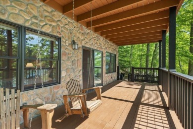 Discover this Custom Built Jubach Log Home perfectly placed on a on Hide-A-Way Hills Golf Club in Ohio - for sale on GolfHomes.com, golf home, golf lot