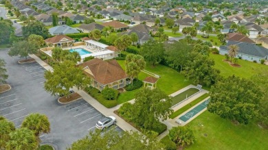 Welcome to this charming 3-bedroom, 2-bathroom bungalow villa on Egret Championship Golf Course in Florida - for sale on GolfHomes.com, golf home, golf lot