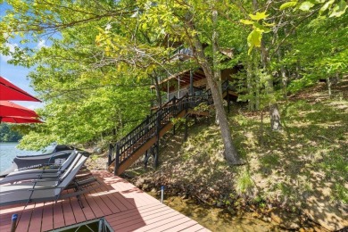 Discover this Custom Built Jubach Log Home perfectly placed on a on Hide-A-Way Hills Golf Club in Ohio - for sale on GolfHomes.com, golf home, golf lot