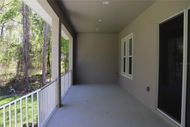 This stunning and luxurious new home by Spire Homes, a on Southern Hills Plantation Club in Florida - for sale on GolfHomes.com, golf home, golf lot