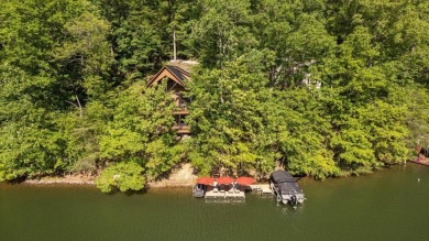 Discover this Custom Built Jubach Log Home perfectly placed on a on Hide-A-Way Hills Golf Club in Ohio - for sale on GolfHomes.com, golf home, golf lot