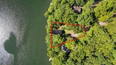 Discover this Custom Built Jubach Log Home perfectly placed on a on Hide-A-Way Hills Golf Club in Ohio - for sale on GolfHomes.com, golf home, golf lot
