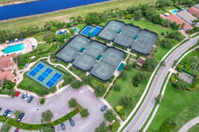 Welcome home to this immaculate 4-bedroom, 4 Bath, one-story on Jupiter Country Club in Florida - for sale on GolfHomes.com, golf home, golf lot