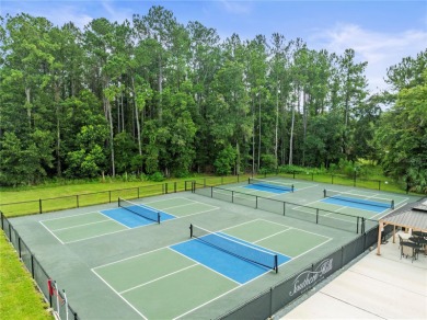 This stunning and luxurious new home by Spire Homes, a on Southern Hills Plantation Club in Florida - for sale on GolfHomes.com, golf home, golf lot