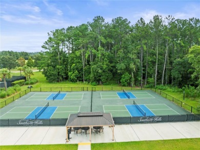 This stunning and luxurious new home by Spire Homes, a on Southern Hills Plantation Club in Florida - for sale on GolfHomes.com, golf home, golf lot