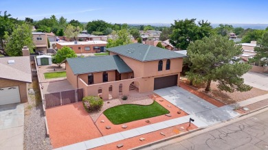 Exceptional Academy Acres home with all the right upgrades! on Arroyo Del Oso Golf Course in New Mexico - for sale on GolfHomes.com, golf home, golf lot