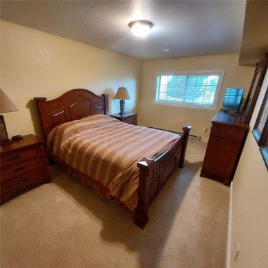 This fully furnished ground level 2BR condo offers excellent on Tagalong Golf Course in Wisconsin - for sale on GolfHomes.com, golf home, golf lot