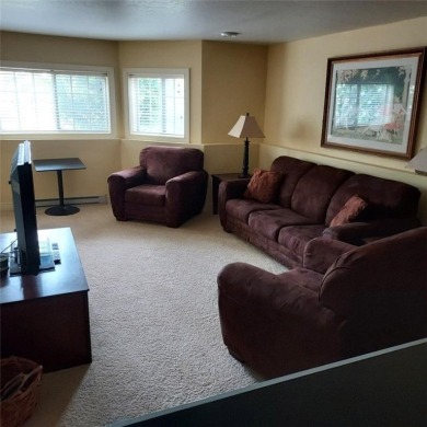 This fully furnished ground level 2BR condo offers excellent on Tagalong Golf Course in Wisconsin - for sale on GolfHomes.com, golf home, golf lot