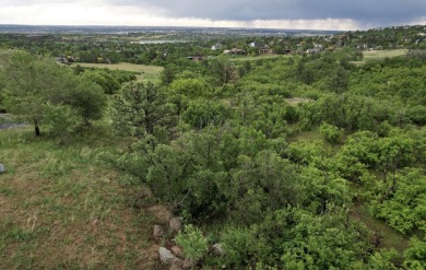 This 1.5 acre has breathtaking views of the Cheyenne Mountains on The Broadmoor Golf Club Mountain Course in Colorado - for sale on GolfHomes.com, golf home, golf lot