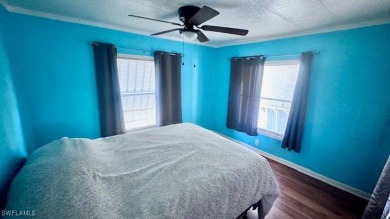 This home has been completely remodeled inside (2023-2024); with on Riverbend Golf and Country Club in Florida - for sale on GolfHomes.com, golf home, golf lot