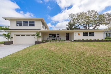 Fully reimagined Fairway Estates home offering over 3,300 sq ft on The Dunedin Country Club in Florida - for sale on GolfHomes.com, golf home, golf lot