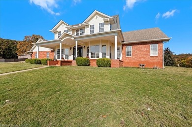 Welcome to your very own everyday retreat. Overlooking the River on Eagle Crest Golf Course in Arkansas - for sale on GolfHomes.com, golf home, golf lot