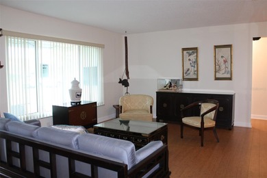 Welcome to this beautifully maintained Eden home with 1598 sq ft on Mainlands Golf Club in Florida - for sale on GolfHomes.com, golf home, golf lot