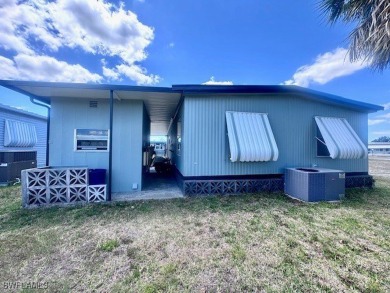 This home has been completely remodeled inside (2023-2024); with on Riverbend Golf and Country Club in Florida - for sale on GolfHomes.com, golf home, golf lot