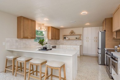 Fully reimagined Fairway Estates home offering over 3,300 sq ft on The Dunedin Country Club in Florida - for sale on GolfHomes.com, golf home, golf lot