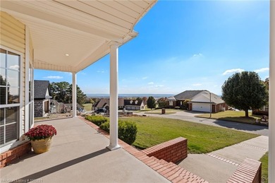 Welcome to your very own everyday retreat. Overlooking the River on Eagle Crest Golf Course in Arkansas - for sale on GolfHomes.com, golf home, golf lot