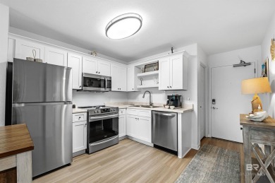 Experience coastal luxury with this fully renovated 2 BR/2 BA on Kiva Dunes Golf Club in Alabama - for sale on GolfHomes.com, golf home, golf lot