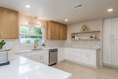 Fully reimagined Fairway Estates home offering over 3,300 sq ft on The Dunedin Country Club in Florida - for sale on GolfHomes.com, golf home, golf lot