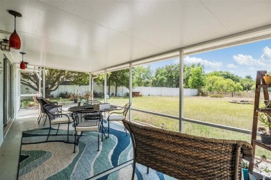 Charming 3-Bedroom Home with Modern Upgrades and Scenic Views in on Oak Hills Country Club in Florida - for sale on GolfHomes.com, golf home, golf lot