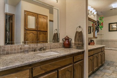 Welcome to this stunning Spanish-style stucco home, perfectly on Lake Tanglewood Golf Course in Texas - for sale on GolfHomes.com, golf home, golf lot