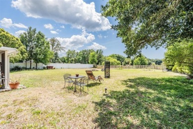 Charming 3-Bedroom Home with Modern Upgrades and Scenic Views in on Oak Hills Country Club in Florida - for sale on GolfHomes.com, golf home, golf lot