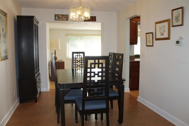 Welcome to this beautifully maintained Eden home with 1598 sq ft on Mainlands Golf Club in Florida - for sale on GolfHomes.com, golf home, golf lot