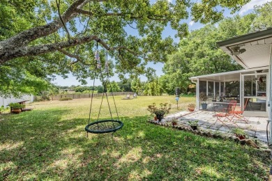 Charming 3-Bedroom Home with Modern Upgrades and Scenic Views in on Oak Hills Country Club in Florida - for sale on GolfHomes.com, golf home, golf lot