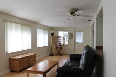 Welcome to this beautifully maintained Eden home with 1598 sq ft on Mainlands Golf Club in Florida - for sale on GolfHomes.com, golf home, golf lot