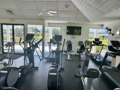 This home has been completely remodeled inside (2023-2024); with on Riverbend Golf and Country Club in Florida - for sale on GolfHomes.com, golf home, golf lot