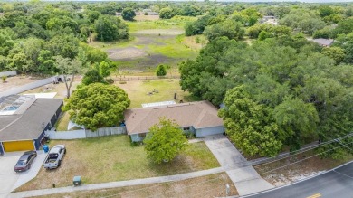 Charming 3-Bedroom Home with Modern Upgrades and Scenic Views in on Oak Hills Country Club in Florida - for sale on GolfHomes.com, golf home, golf lot