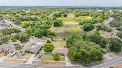 Charming 3-Bedroom Home with Modern Upgrades and Scenic Views in on Oak Hills Country Club in Florida - for sale on GolfHomes.com, golf home, golf lot